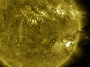 NASA Science News - frame from ultraviolet movie of the explosion shows a 'solar tsunami' wave